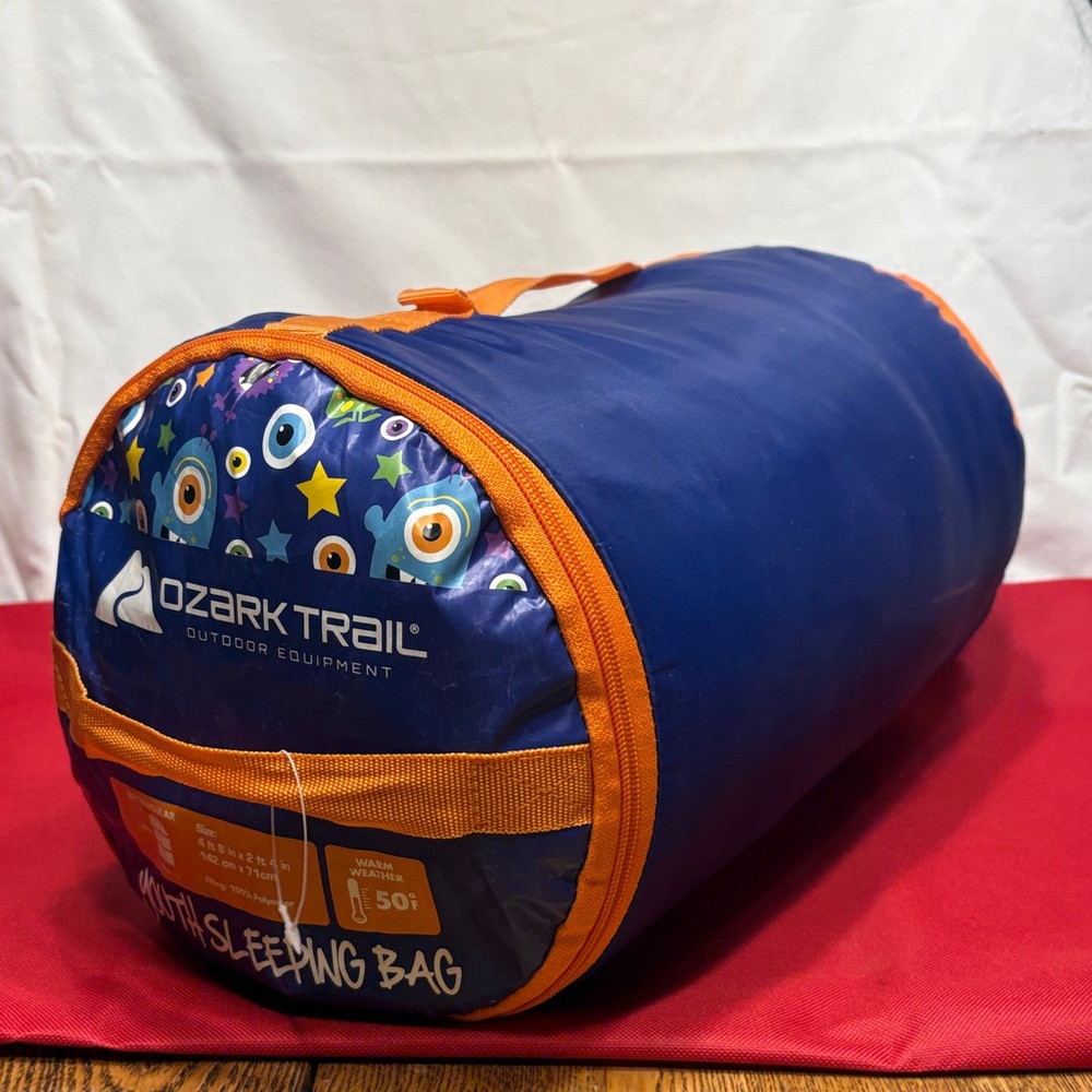 Ozark Trail Vibrant Blue and Orange Youth Sleeping Bag Rectangular